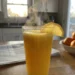 Fresh organic carrots, ginger, and lemon for Morning Glow Juice.